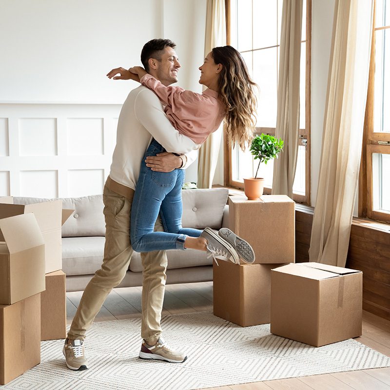 first-home-buyer-couple-happy-unpacking